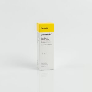 A product image of Dr Jart+ Ceramidin Skin Barrier Serum Toner, featuring a yellow and white box with the text "Dr.Jart+ Ceramidin Skin Barrier Serum Toner" and "150ml / 5 fl. oz.