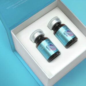Two bottles of ILLUMA NAD+ presented in a gift box, designed to support energy, focus and cellular health.