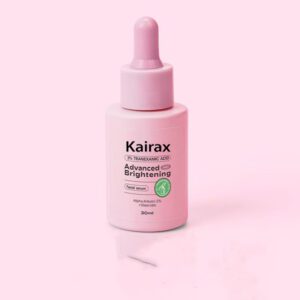 A 30ml bottle of Kairax Advanced Brightening Serum with a pink dropper cap, featuring a label that reads "3% Tranex